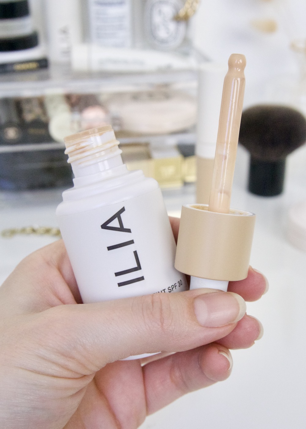 ILIA Beauty Super Serum Skin Tint in hand